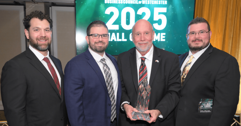 From left to right, Paul Viggiano, George Williams Jr., George Williams Sr., and Nick Williams from A.G. Williams Painting Company pose while holding the 2025 Hall of Fame award. Photo courtesy of John Vecchiolla.