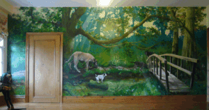 Hand-painted forest mural featuring dogs and a wooden bridge in a lush woodland scene.