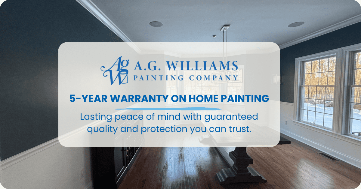 Elegantly painted dining room with deep blue walls and white wainscoting, promoting a 5-year warranty from A.G. Williams Painting Company.