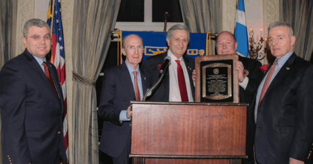 George Williams of A.G. Williams Painting Company receives a community leadership award from AHEPA at a formal ceremony in Pelham New York.