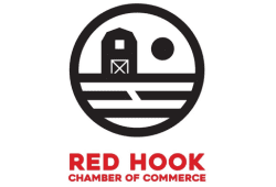 Red Hook Chamber of Commerce logo featuring a circular farm icon with a barn and sun above the organization’s name in red text.
